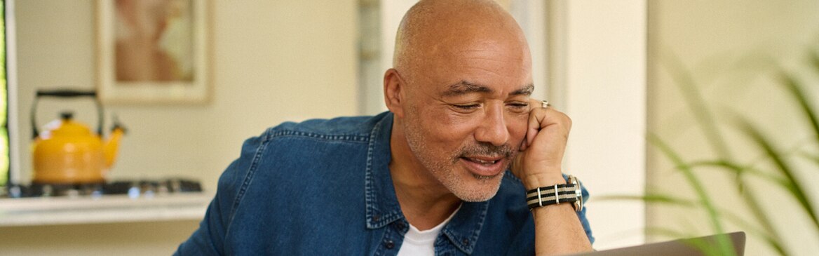 Man sitting outside having a conversation 