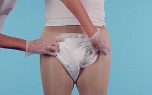 How to apply TENA Comfort on user standing up